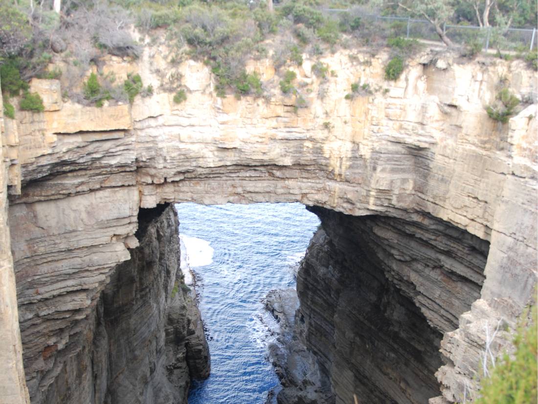 The Tasman Peninsula sea-cliffs are filled with natural features such as the giant Tasman Arch |  <i>Chris Buykx</i>